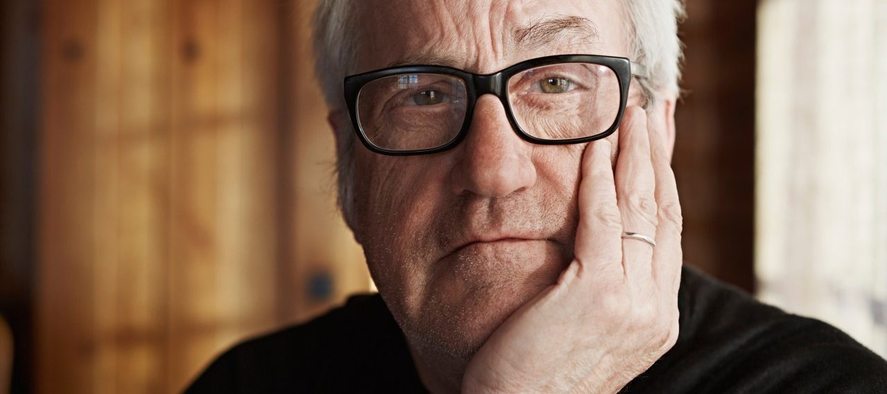 Senior man with grey hair and glasses --- Image by © Frank and Helena/Corbis