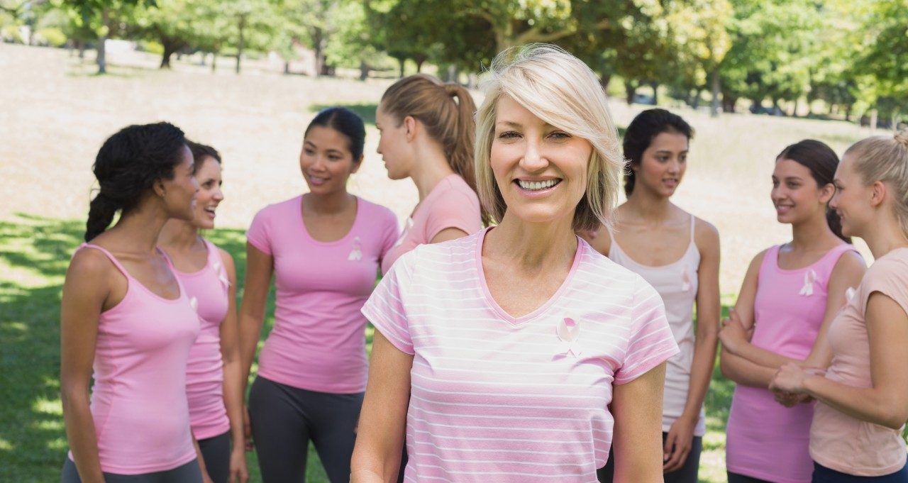 12 Nov 2013 --- Confident woman supporting breast cancer awareness --- Image by © Wavebreak Media LTD/Wavebreak Media Ltd./Corbis