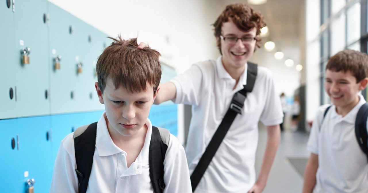 31 Oct 2013 --- Schoolboy being bullied in school corridor --- Image by © Phil Boorman/Corbis