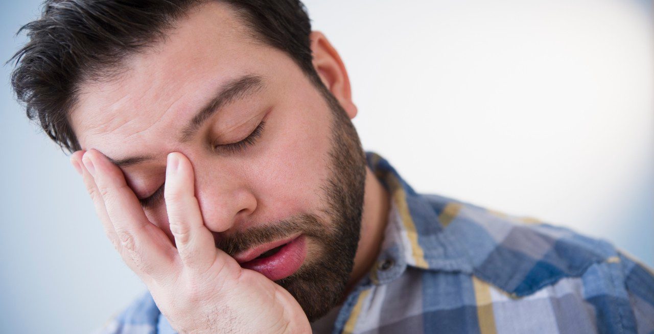 20 Feb 2013 --- Portrait of tired man --- Image by © Jamie Grill/Tetra Images/Corbis