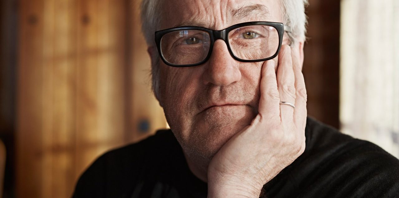 Senior man with grey hair and glasses --- Image by © Frank and Helena/Corbis