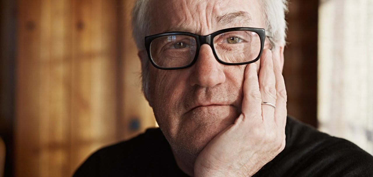 Senior man with grey hair and glasses --- Image by © Frank and Helena/Corbis