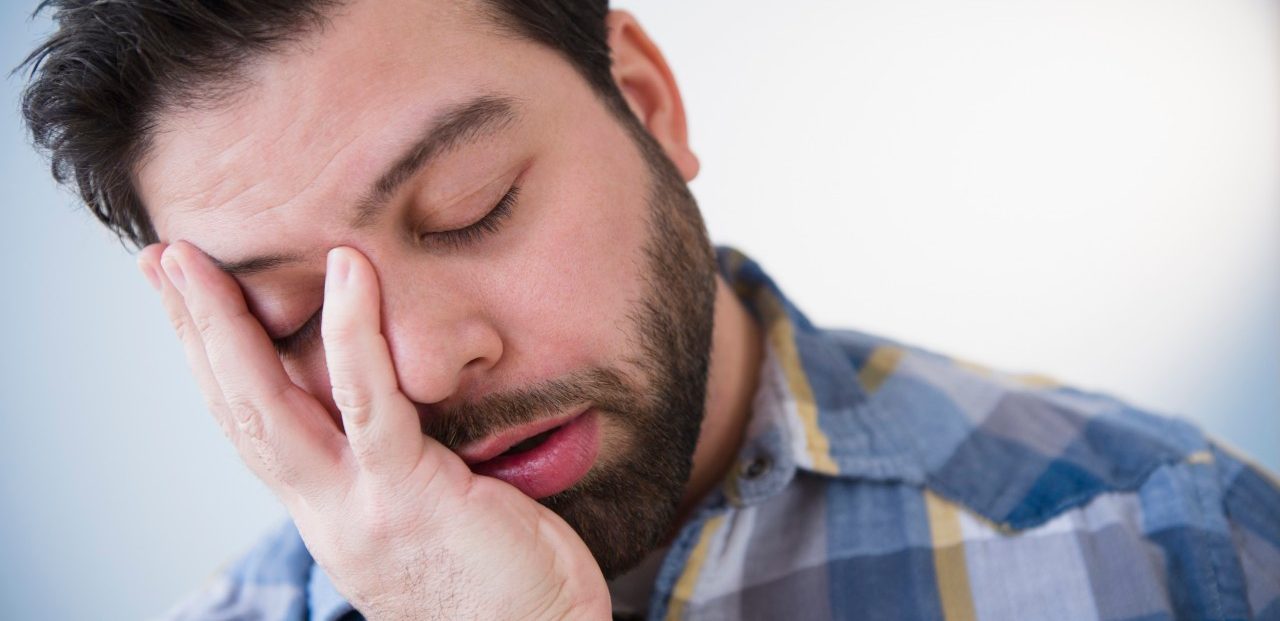 20 Feb 2013 --- Portrait of tired man --- Image by © Jamie Grill/Tetra Images/Corbis