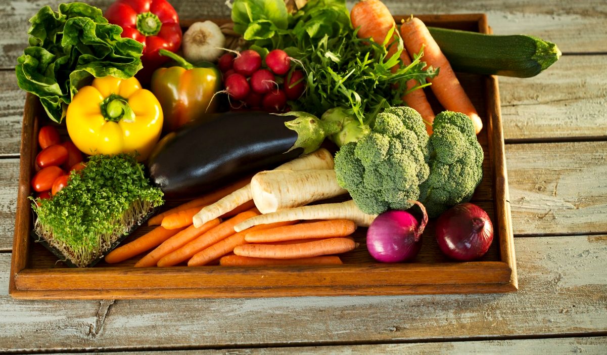 13 Jan 2015 --- Wooden tray with different vegetables --- Image by © Roman Märzinger/Westend61/Corbis