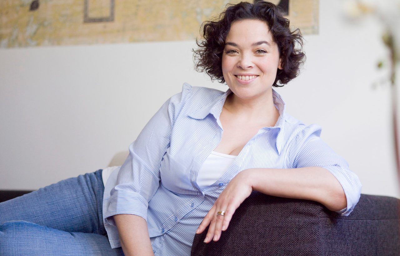 Woman relaxing on the sofa. --- Image by © Lily Bloom/cultura/Corbis