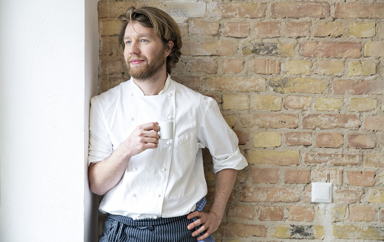 27 Mar 2015, Berlin, Germany --- Portrait of cook with espresso cup having a rest --- Image by © Florian Küttler/Westend61/Corbis