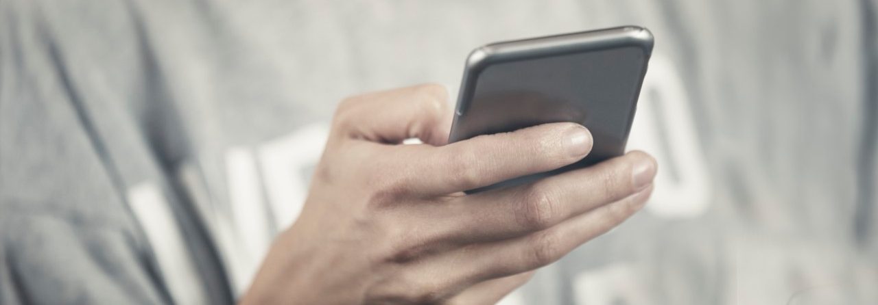 24 Apr 2015 --- Woman using smartphone --- Image by © Arman Zhenikeyev/Corbis