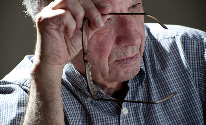 28 Jun 2012, England, UK --- concerned mature seventy year old retired person --- Image by © David Burton/Corbis