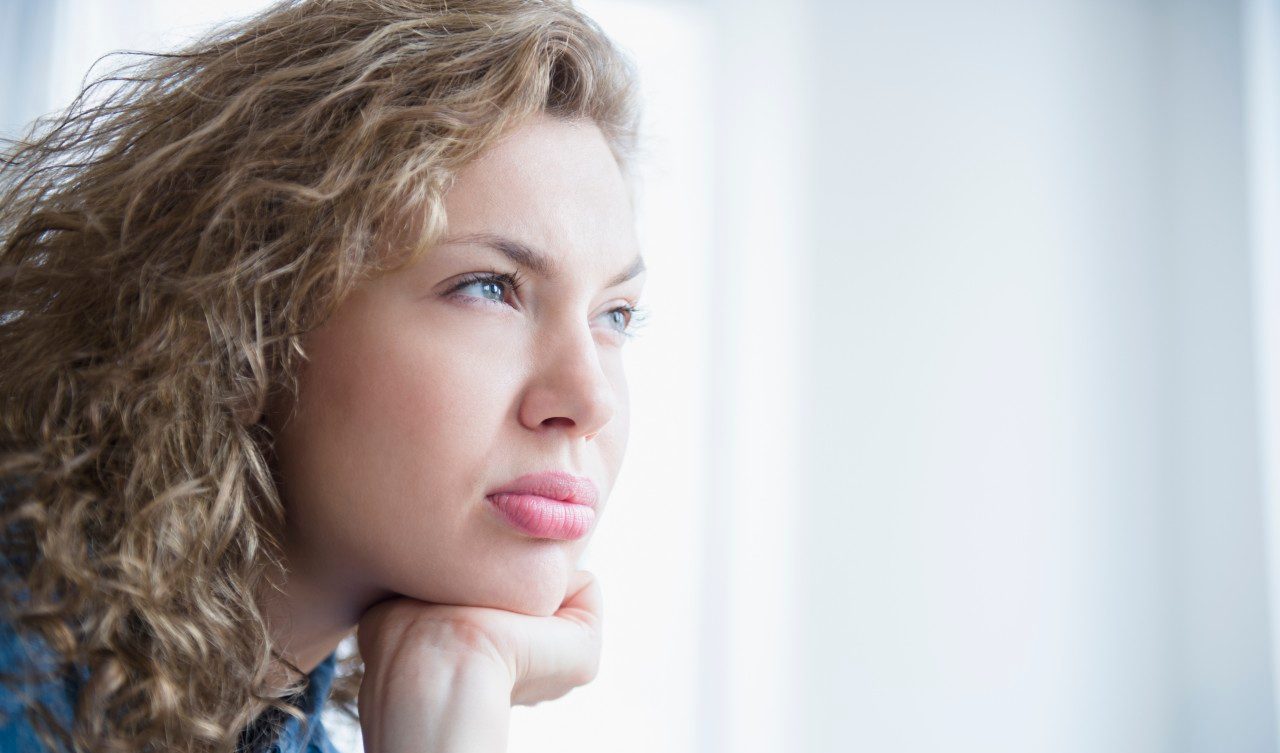 30 Jul 2014 --- Portrait of attractive young woman --- Image by © Jamie Grill/Tetra Images/Corbis