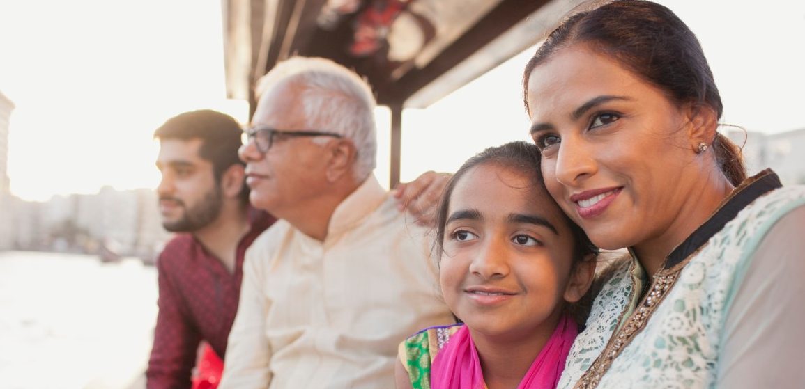 06 Nov 2014, Dubai, United Arab Emirates --- Girl (10-12) with family on boat, Dubai, Dubai Emirate, United Arab Emirates --- Image by © Katarina Premfors/arabianEye/arabianEye/Corbis