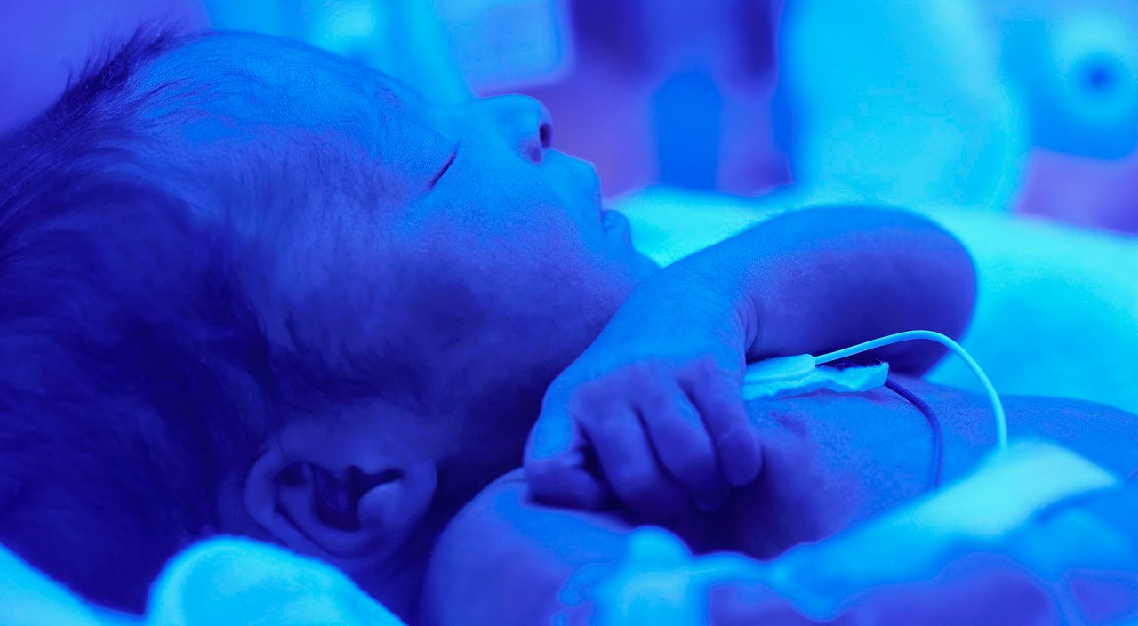 Premature Baby in Incubator --- Image by © Corbis