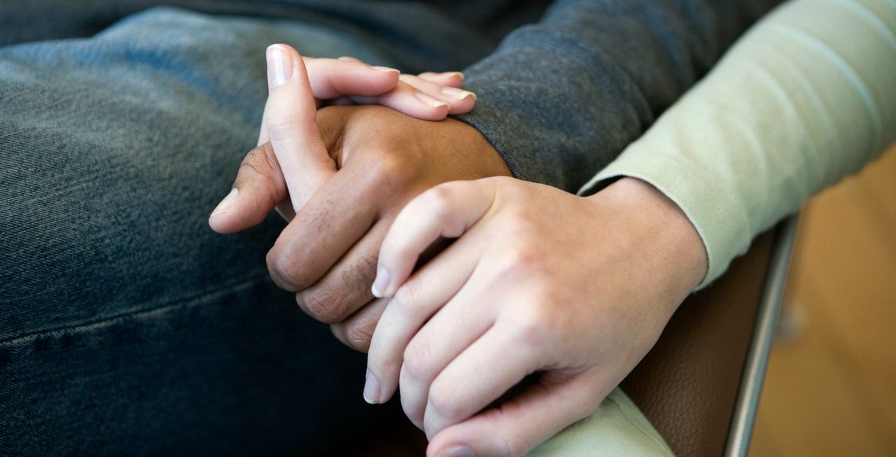 Couple Holding Hands --- Image by © Timothy Tadder/Corbis