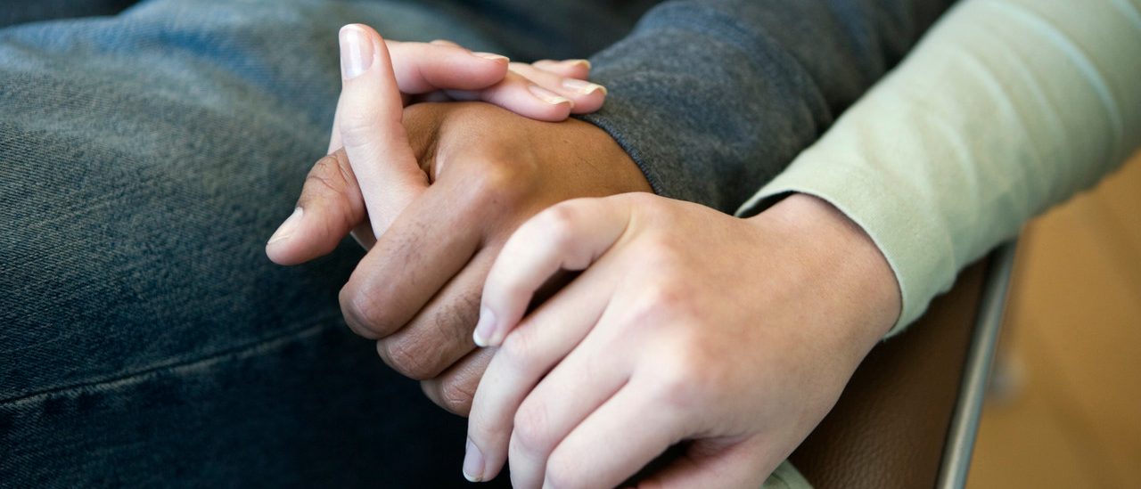 Couple Holding Hands --- Image by © Timothy Tadder/Corbis