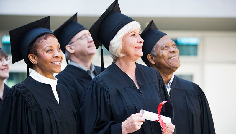 Senor Students Graduating --- Image by Â© Rob Melnychuk/Corbis