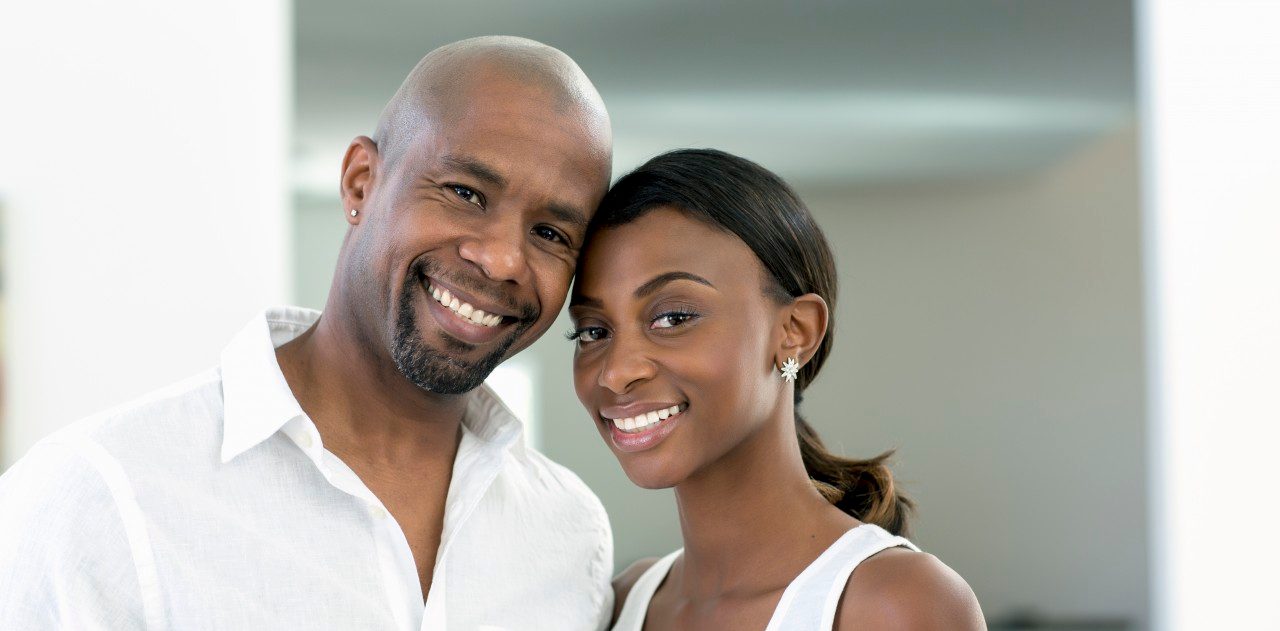 01 Apr 2012 --- Smiling Black couple --- Image by © Inti St Clair/Blend Images/Corbis