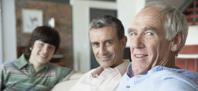 Grandfather sitting with son and grandson --- Image by Â© Tomas Rodriguez/Corbis