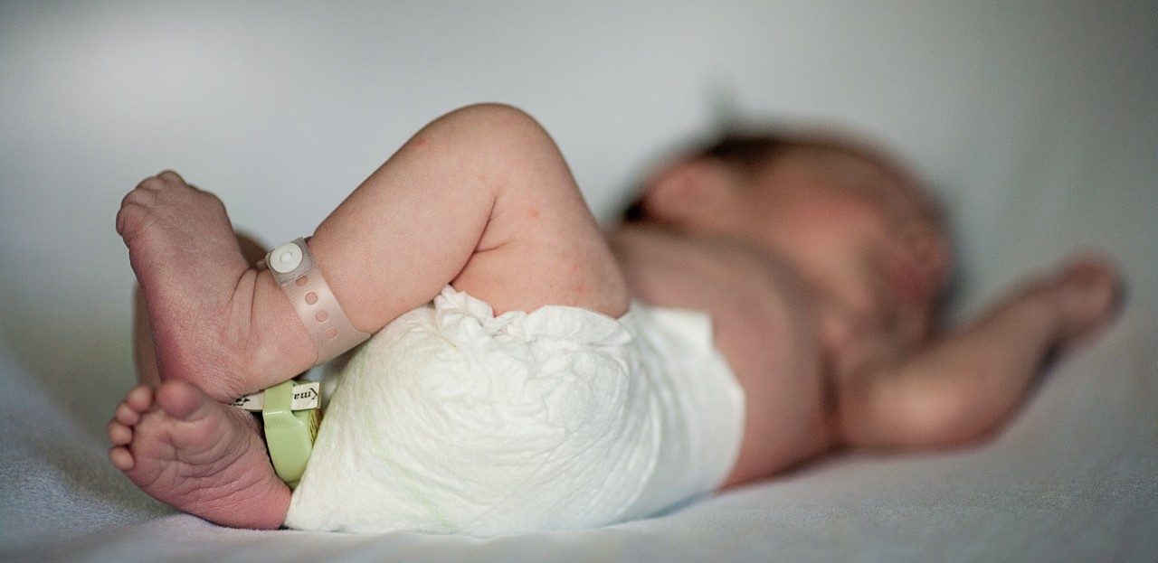 15 Jan 2011 --- New born baby sleeping in hospital, Massachusetts, USA --- Image by © snezhana/Corbis