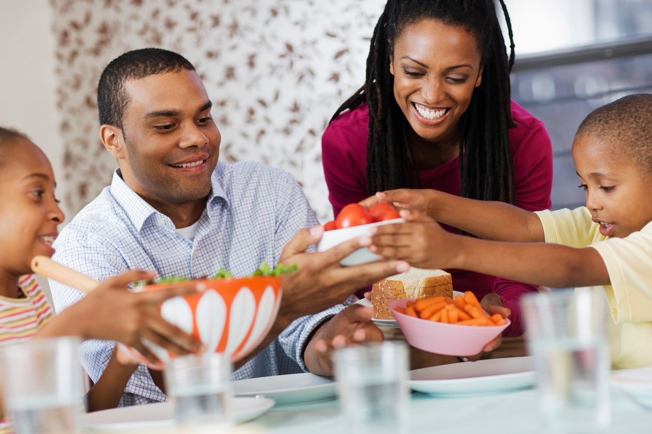 Family Having Meal --- Image by © Randy Faris/Corbis