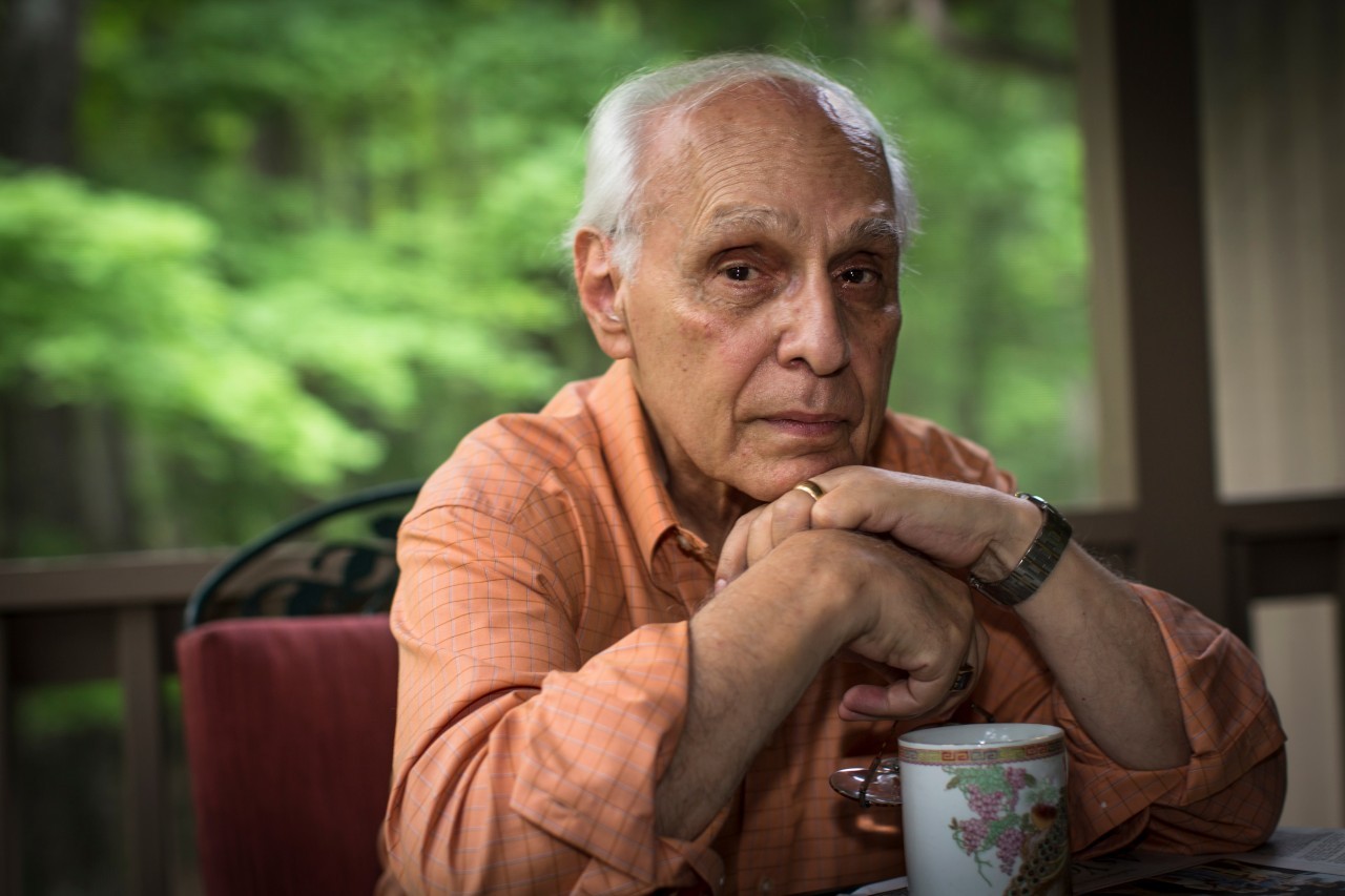 Senior man with hands on chin, portrait --- Image by © Steve Prezant/Corbis