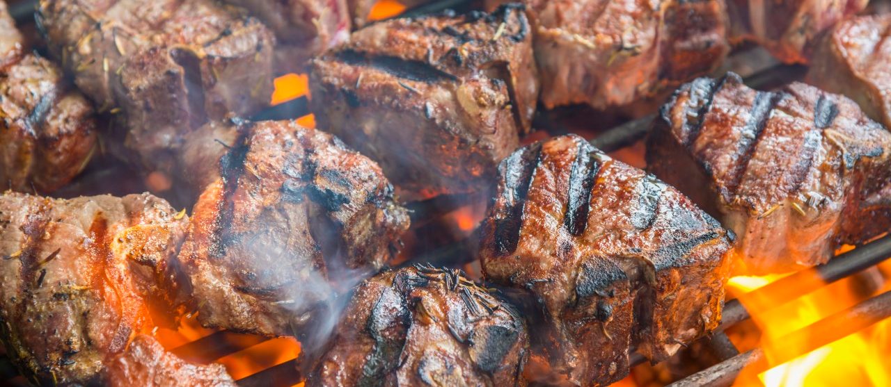 01 May 2013 --- Grilling T bone steaks on barbecue, close up --- Image by © André Babiak/Westend61/Corbis