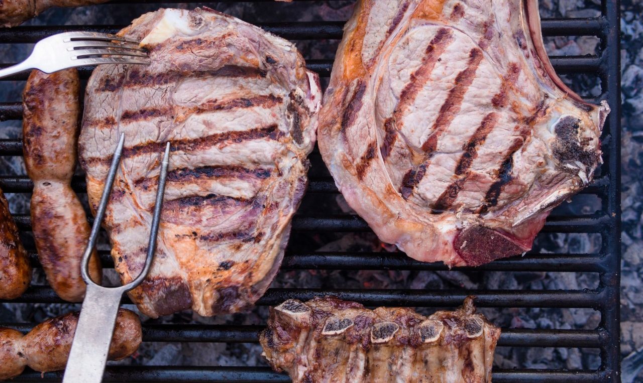 03 Sep 2014 --- Italian barbecue with Bistecca alla Fiorentina, Salsiccia and cured pork --- Image by © Gerald Staufer/Westend61/Corbis