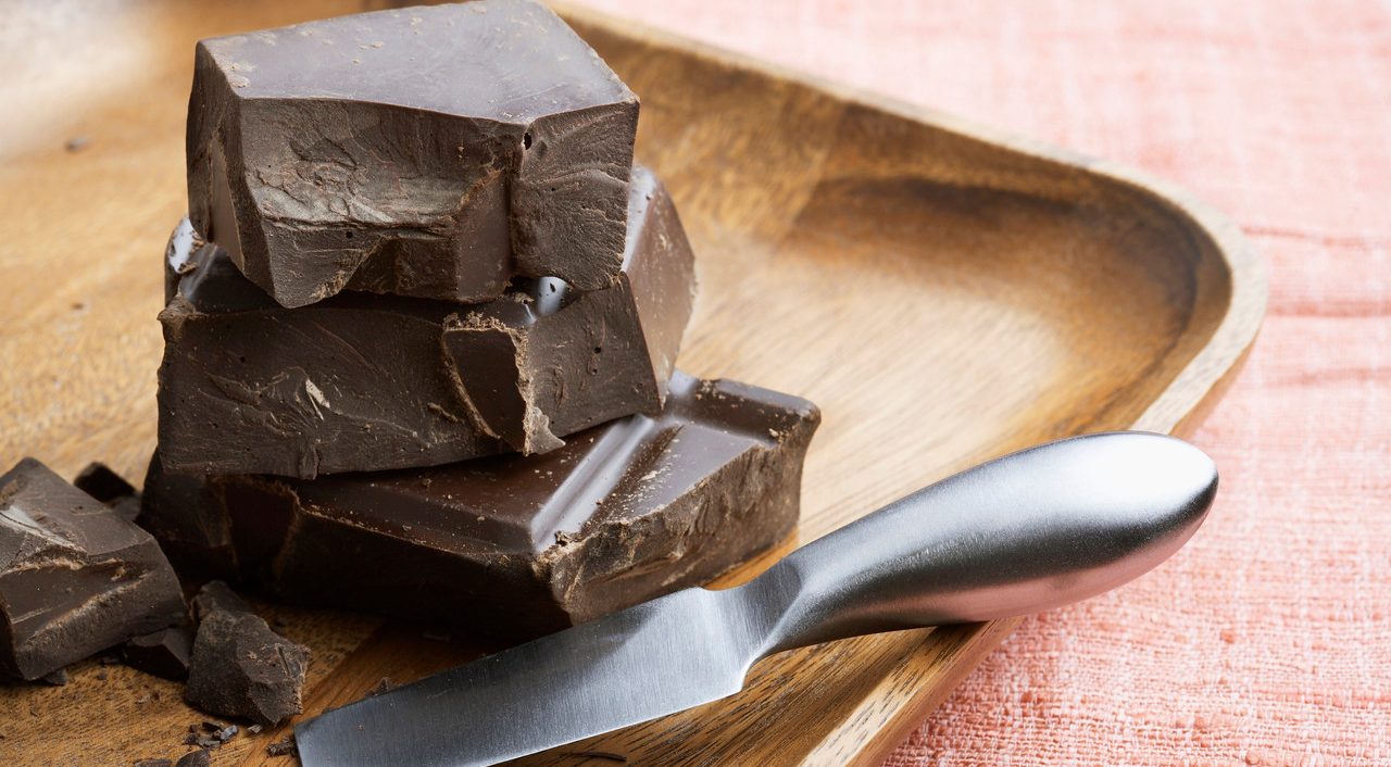 Dark Chocolate Pieces on Tray --- Image by © amanaimages/Corbis