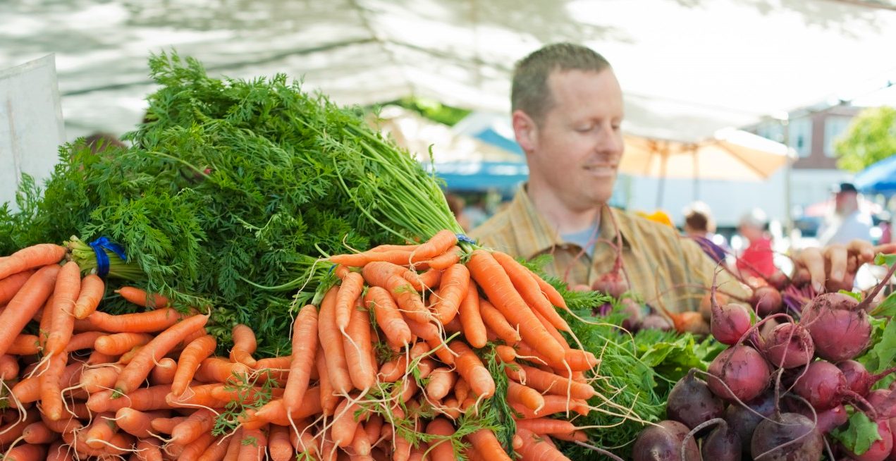 Locally grown organic produce at farmers' market --- Image by © Helen King/Corbis