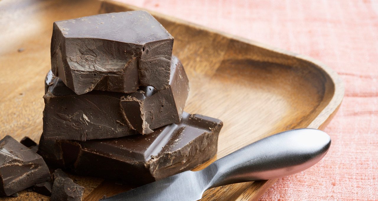 Dark Chocolate Pieces on Tray --- Image by © amanaimages/Corbis