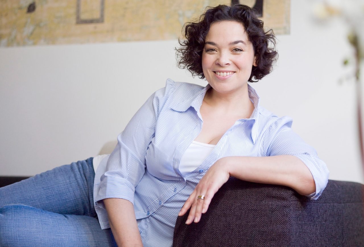 Woman relaxing on the sofa. --- Image by © Lily Bloom/cultura/Corbis