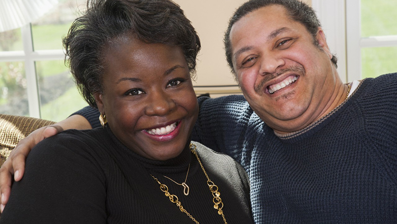 Portrait of Happy Mature Couple at Home --- Image by © Radius Images/Corbis