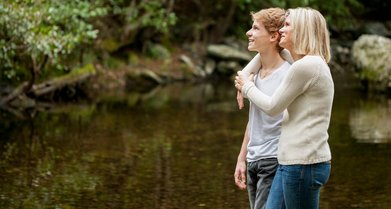 26 Oct 2013 --- Mother and son enjoying in a park --- Image by © Letizia Le Fur/Onoky/Corbis