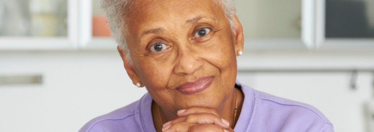 13 Dec 2011 --- Smiling African American woman --- Image by © Rolf Bruderer/Blend Images/Corbis