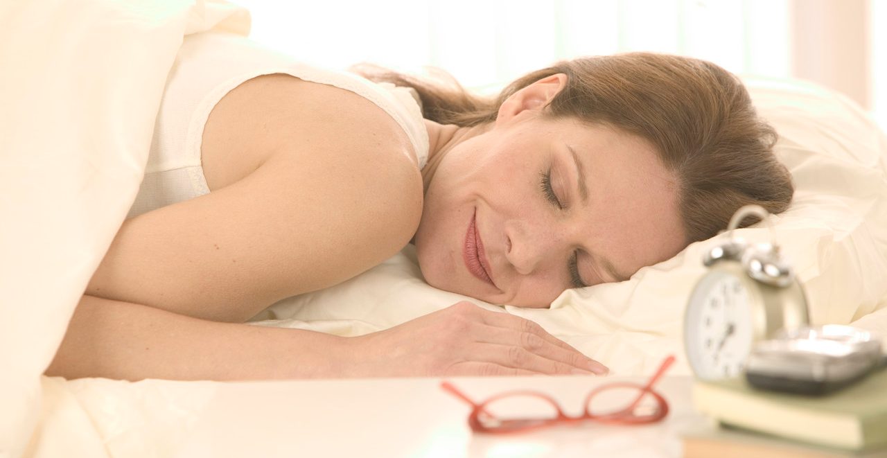 Woman Sleeping Peacefully --- Image by © Tom Grill/Corbis