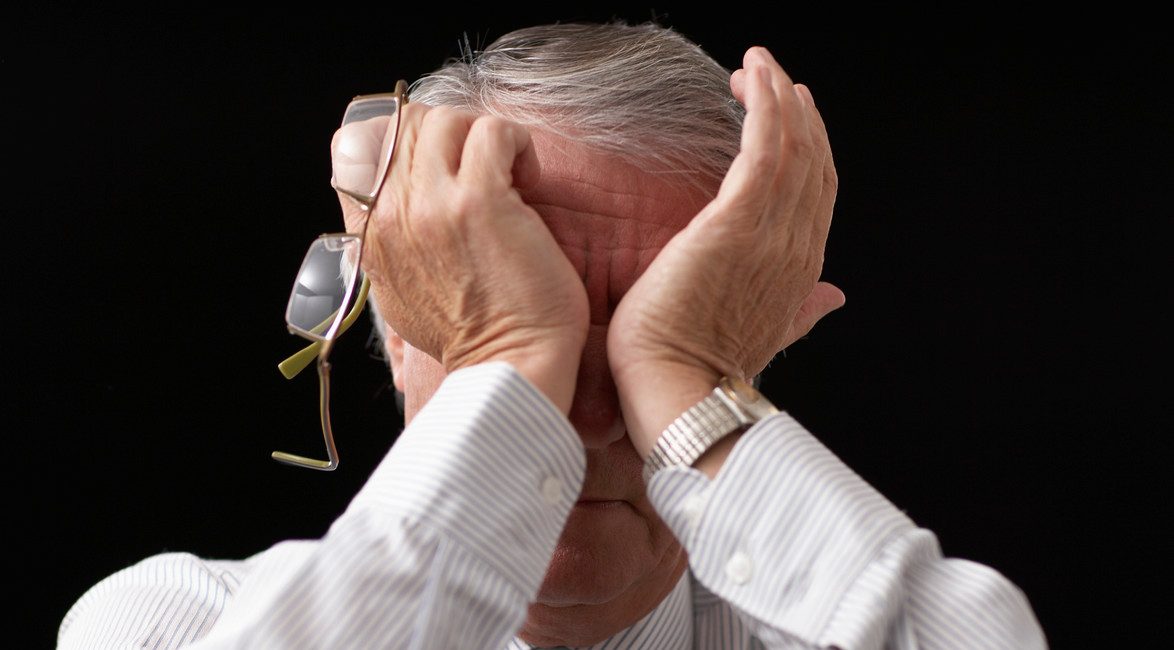 Tired Businessman --- Image by © Tim Pannell/Corbis