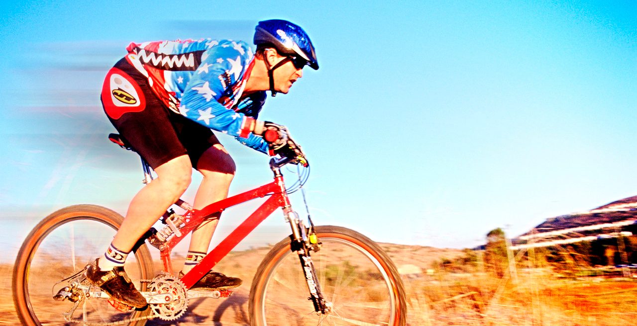 Mountain Biker in the Wilderness --- Image by © Corbis