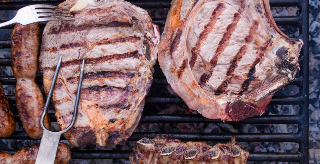 03 Sep 2014 --- Italian barbecue with Bistecca alla Fiorentina, Salsiccia and cured pork --- Image by © Gerald Staufer/Westend61/Corbis